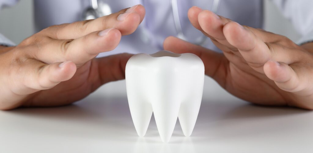 close up man holding hands table