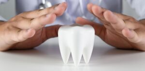 close up man holding hands table